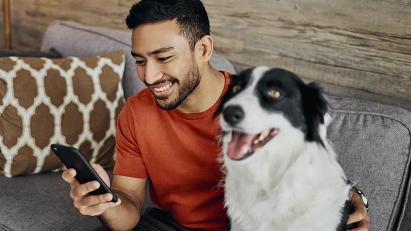Man with his happy dog